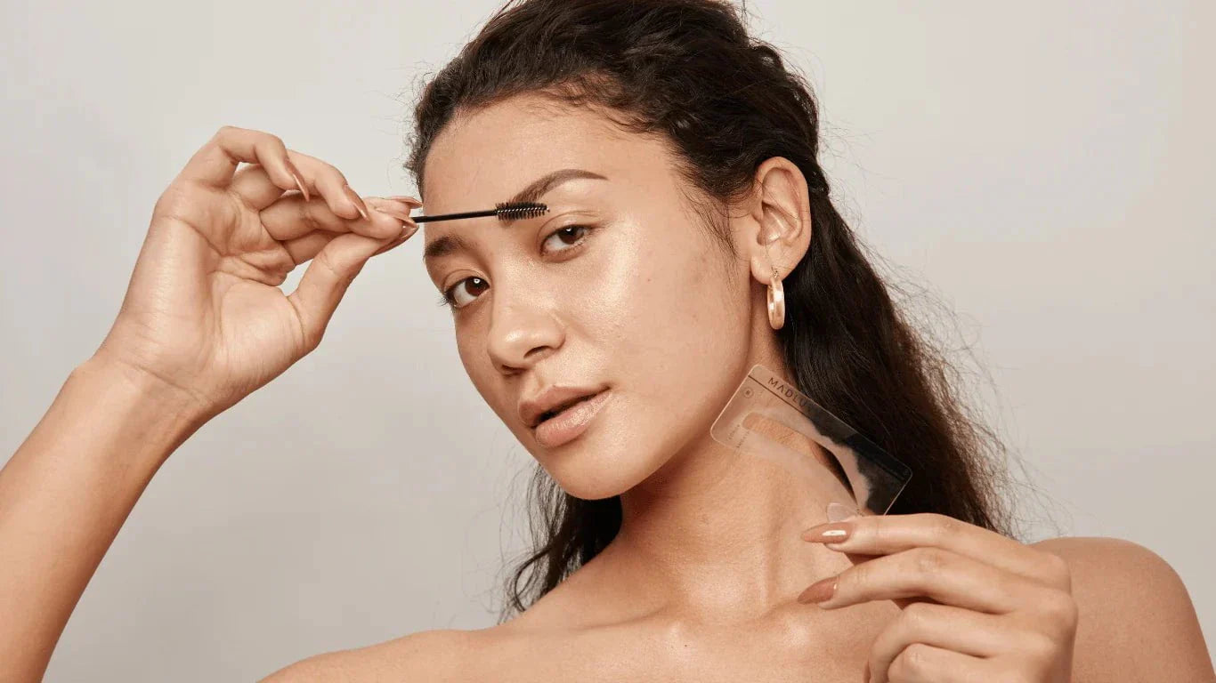 Woman using Madluvv Brow Stamp Kit