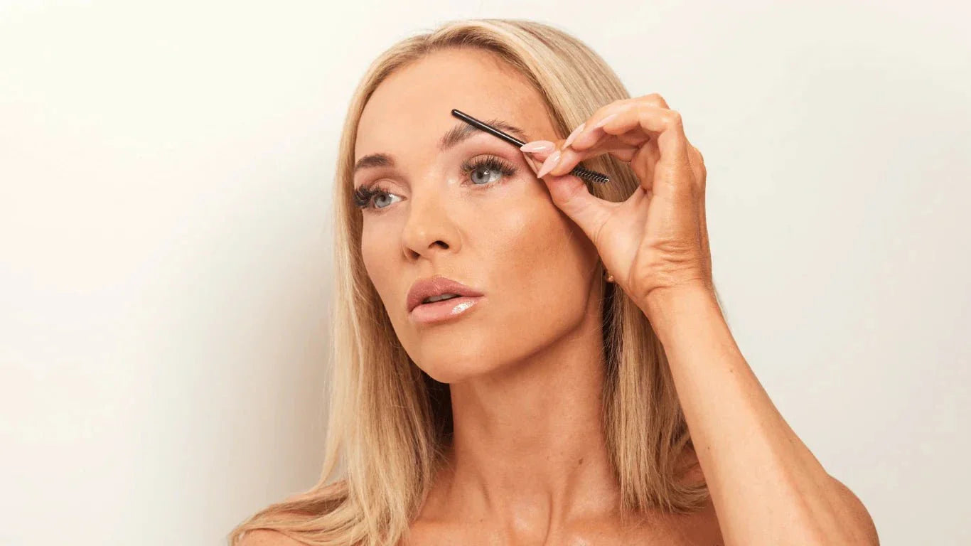 Slicking brows back