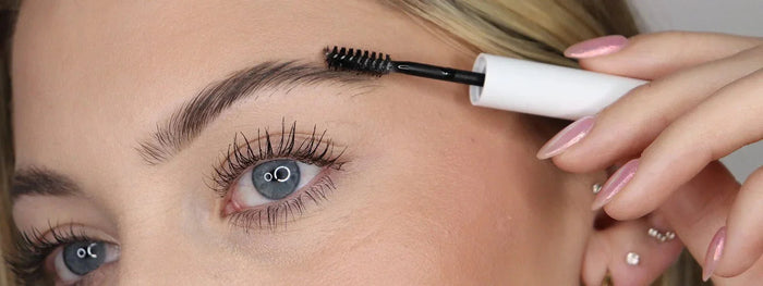 Woman using clear brow gel