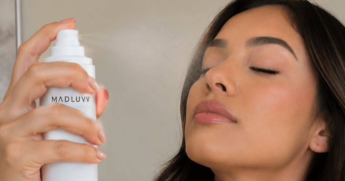 woman using oil control setting spray